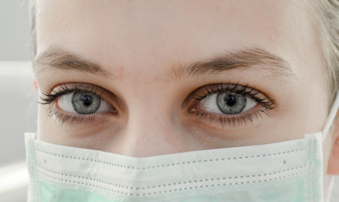photo of nurse's eyes above mask 